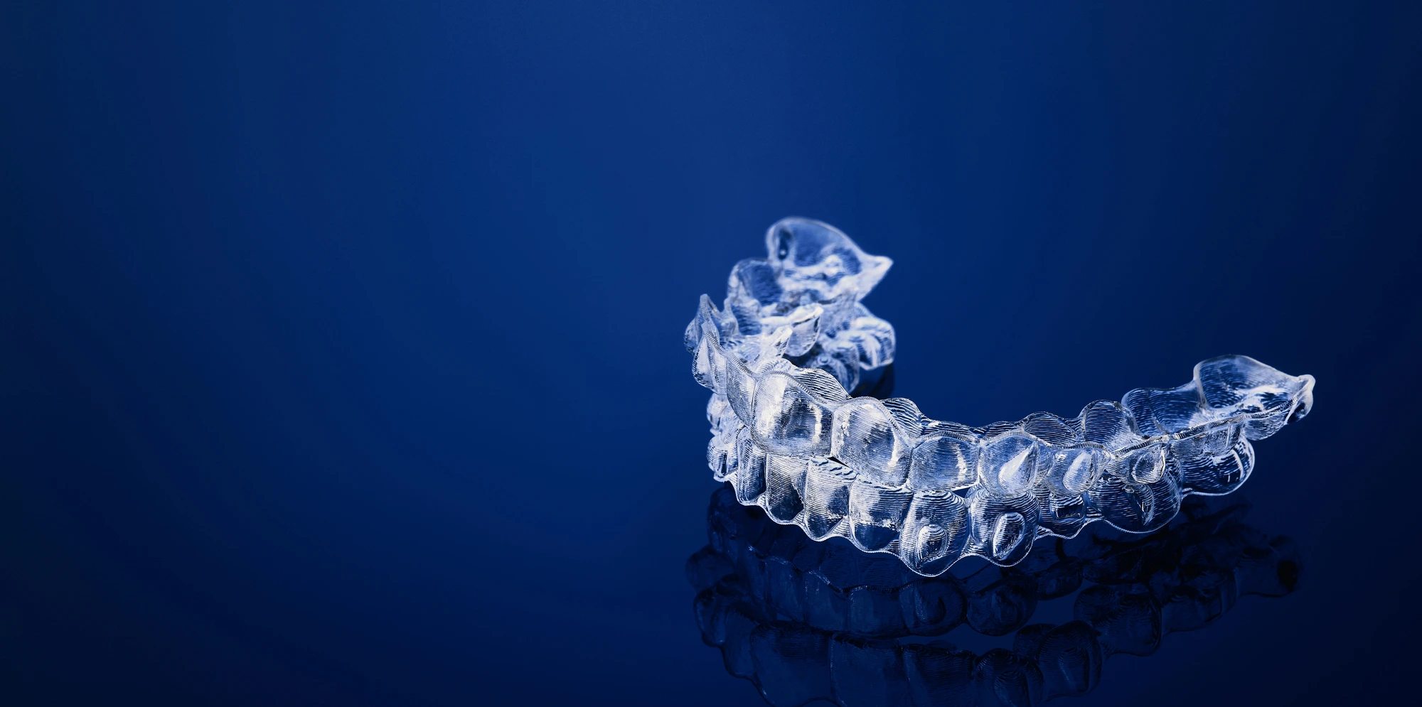 Invisalign in Dilworth, NC over blue background