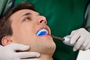close up of patient getting teeth cleaning in Charlotte, NC