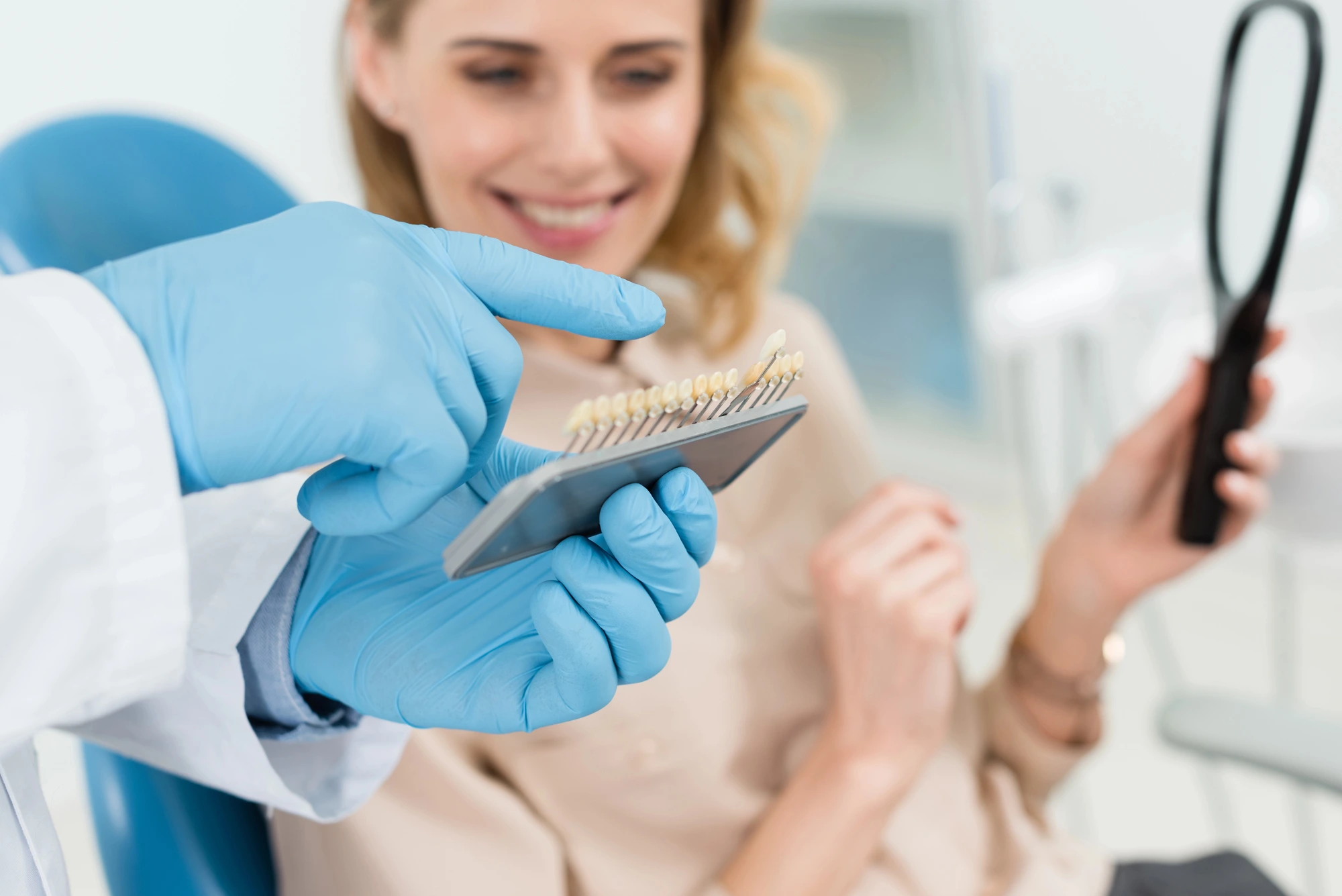 dentist explaining dental crowns in Charlotte to patient