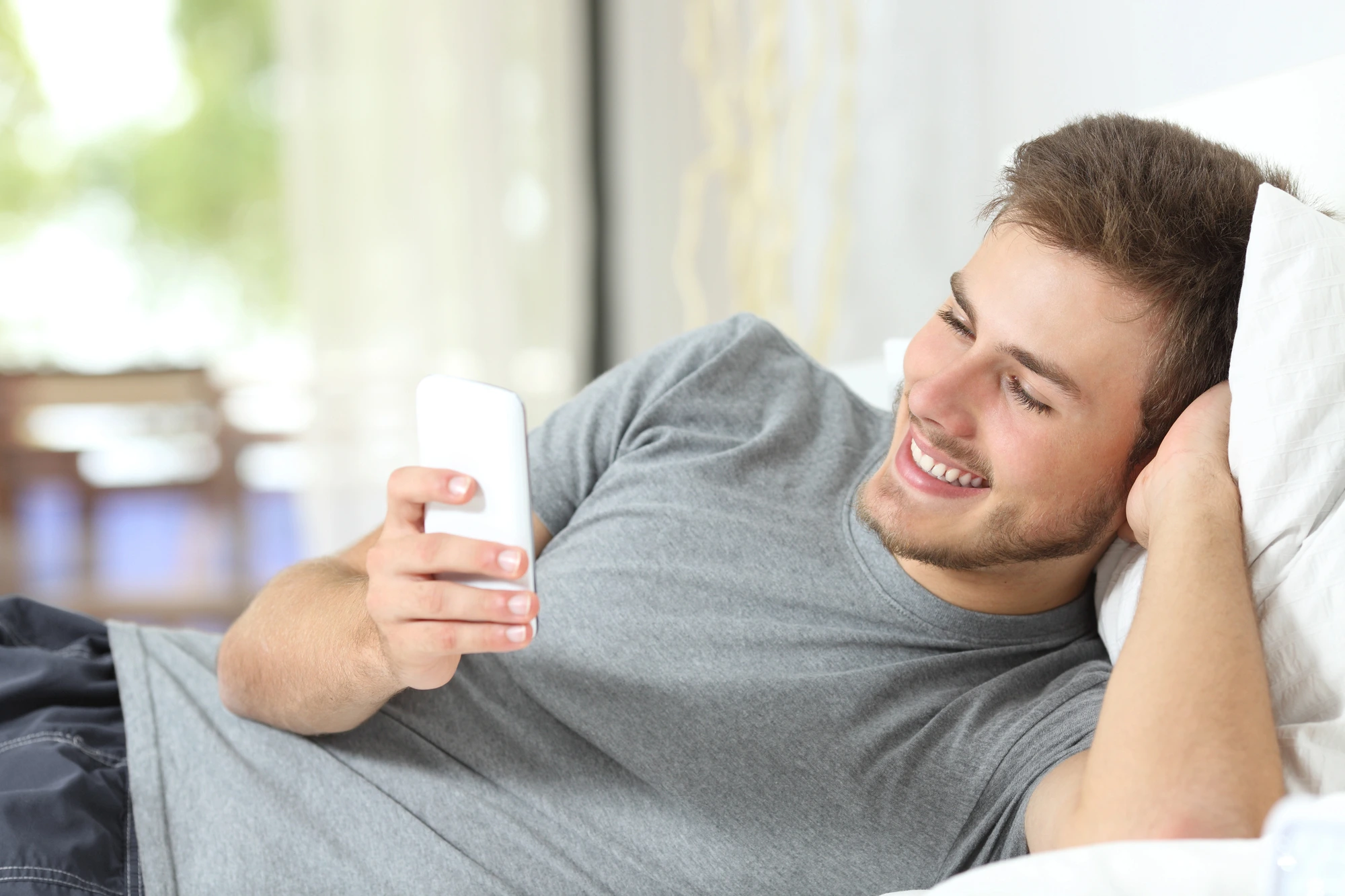 happy man after using Invisalign in Uptown Charlotte