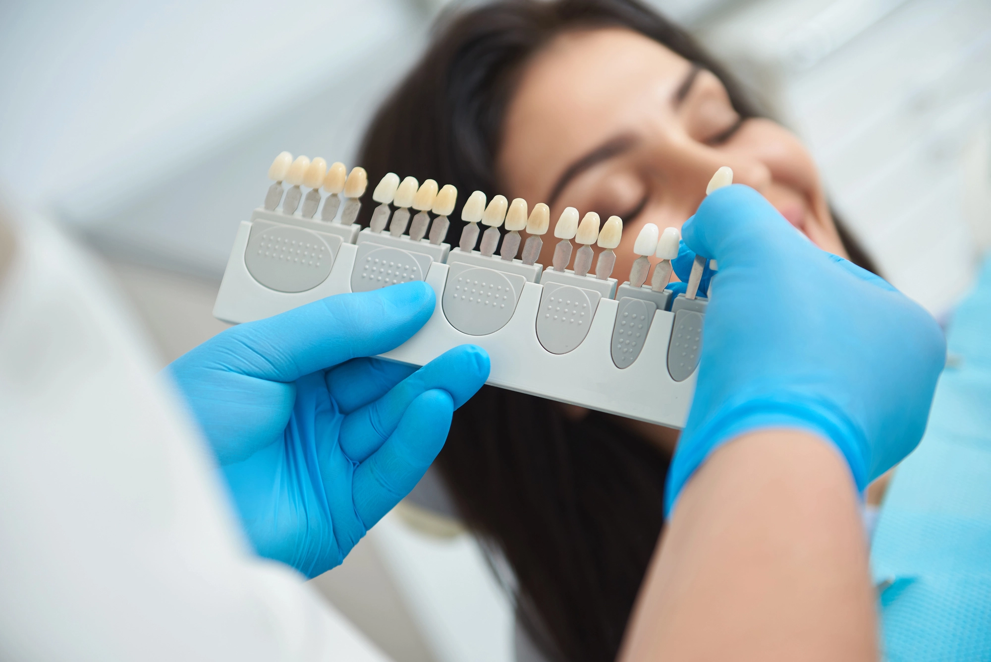 patient and dentist evaluating dental crowns in South Charlotte