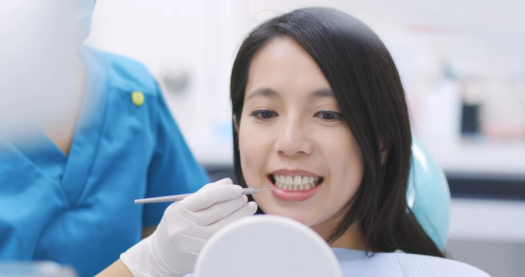 patient getting dental bridges in Charlotte