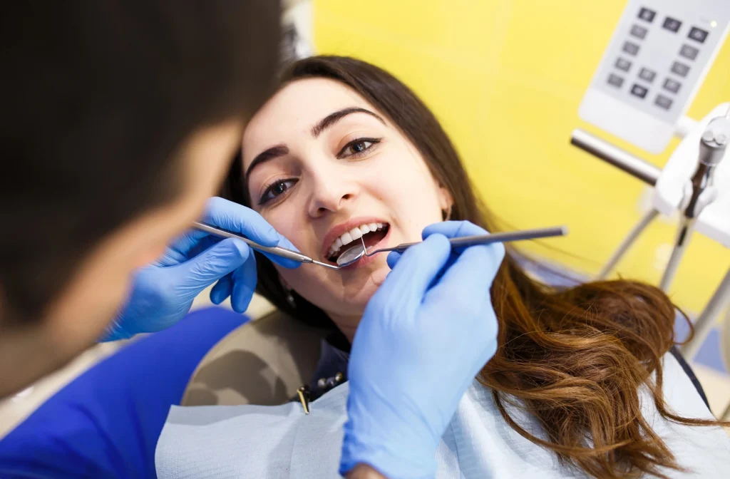 patient getting dental bridges in Charlotte, NC
