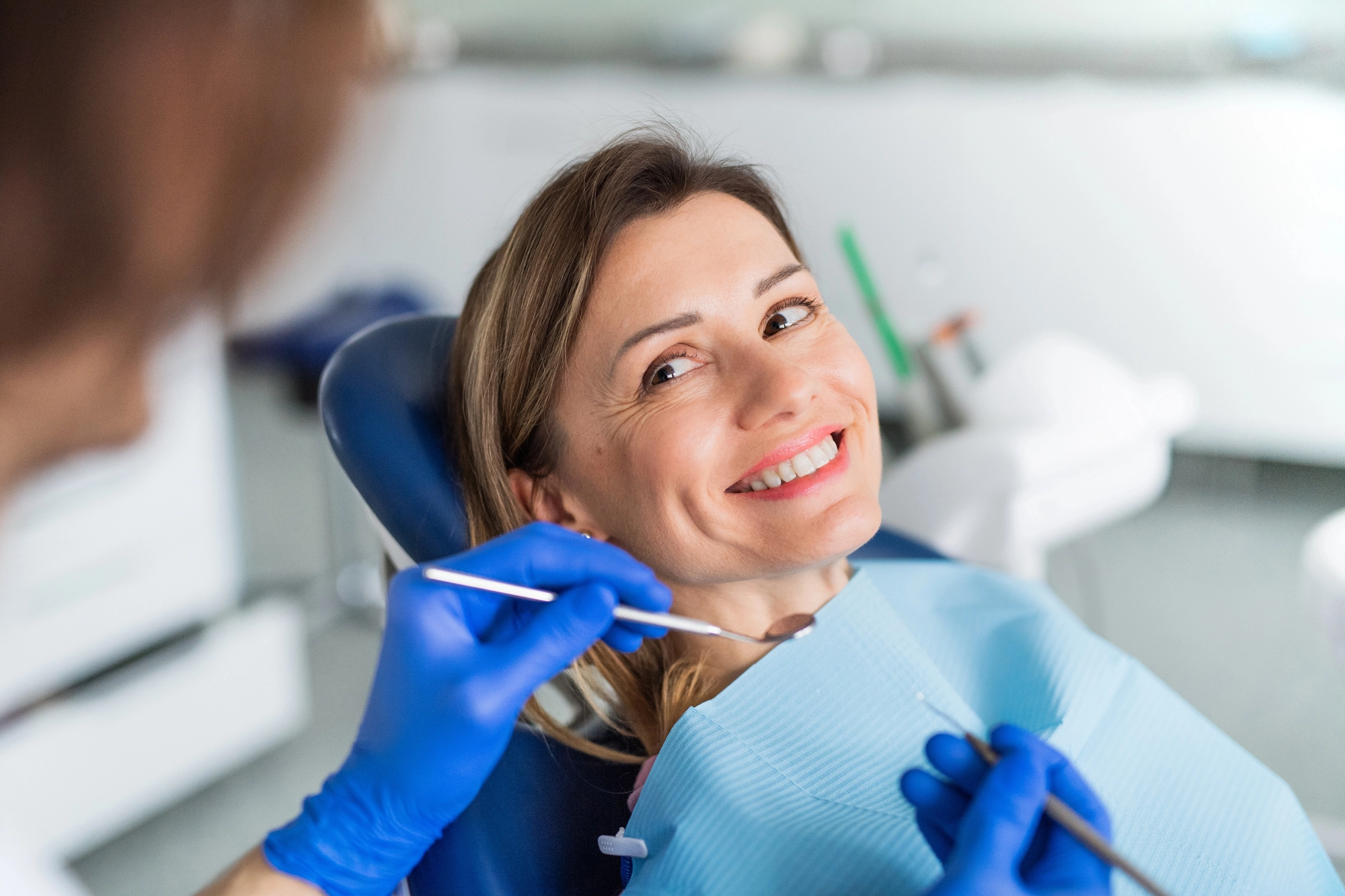 patient happy before getting dental crowns in South Charlotte