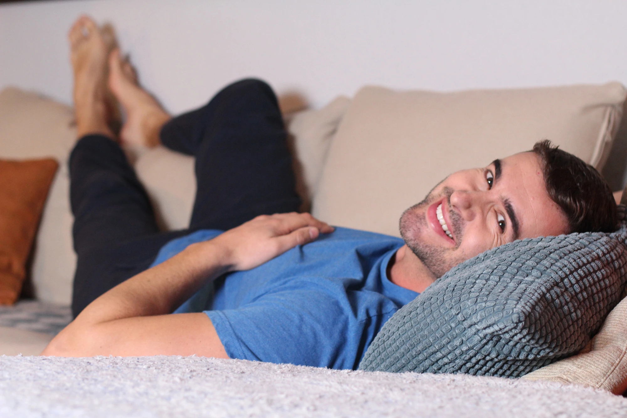 relaxed man after getting dental crowns in Charlotte
