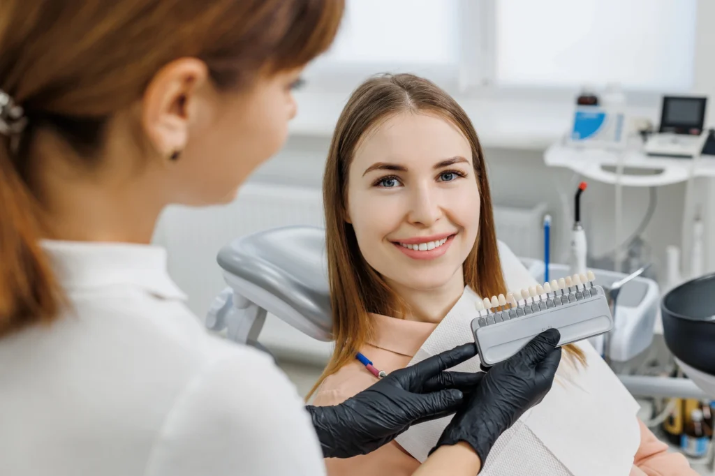 woman at the dentist discussing veneers in South Charlotte