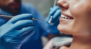 woman getting veneers with cosmetic dentists in Park Road, NC