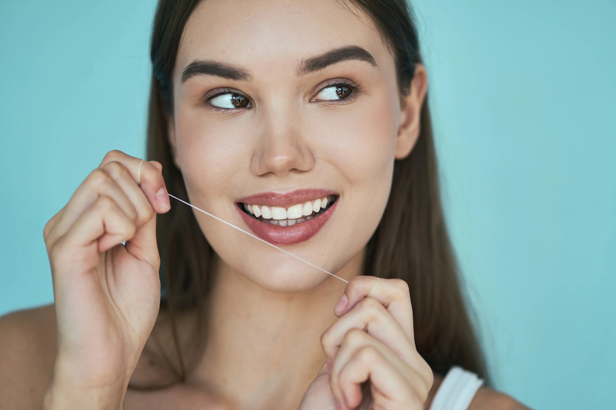 woman happy after teeth cleaning in Charlotte, NC