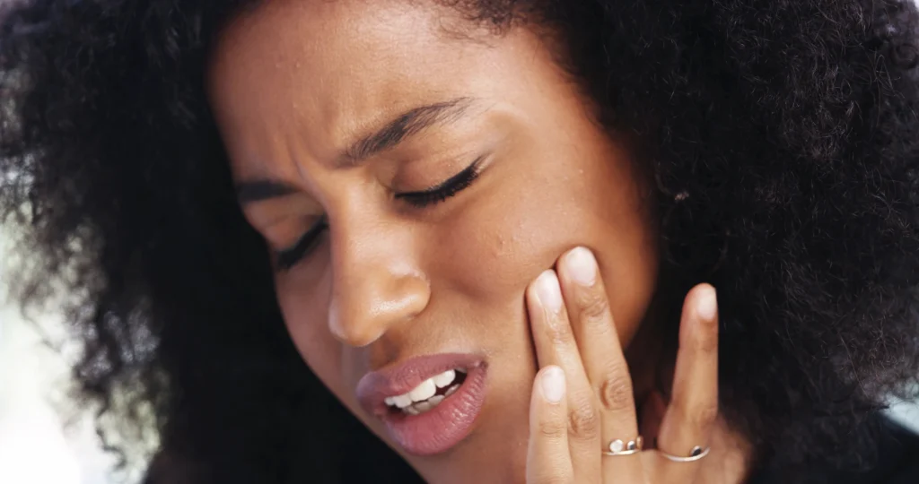 woman in pain before Botox for TMJ in Charlotte, NC (1)
