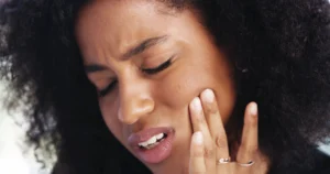 woman in pain before Botox for TMJ in Charlotte, NC (1)