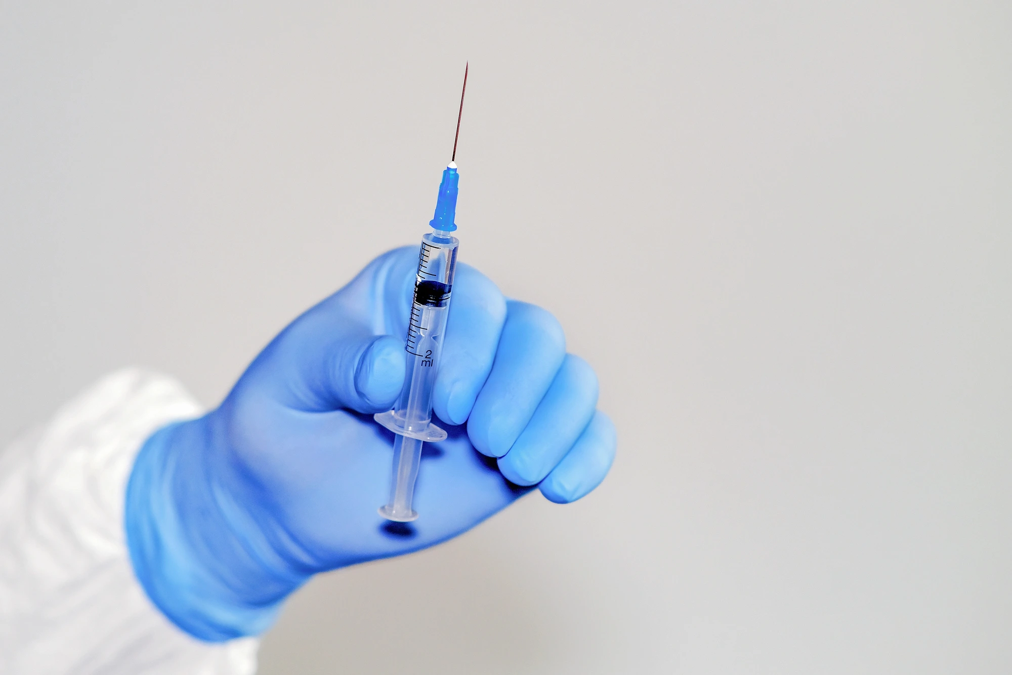 Botox dentist near me holding syringe