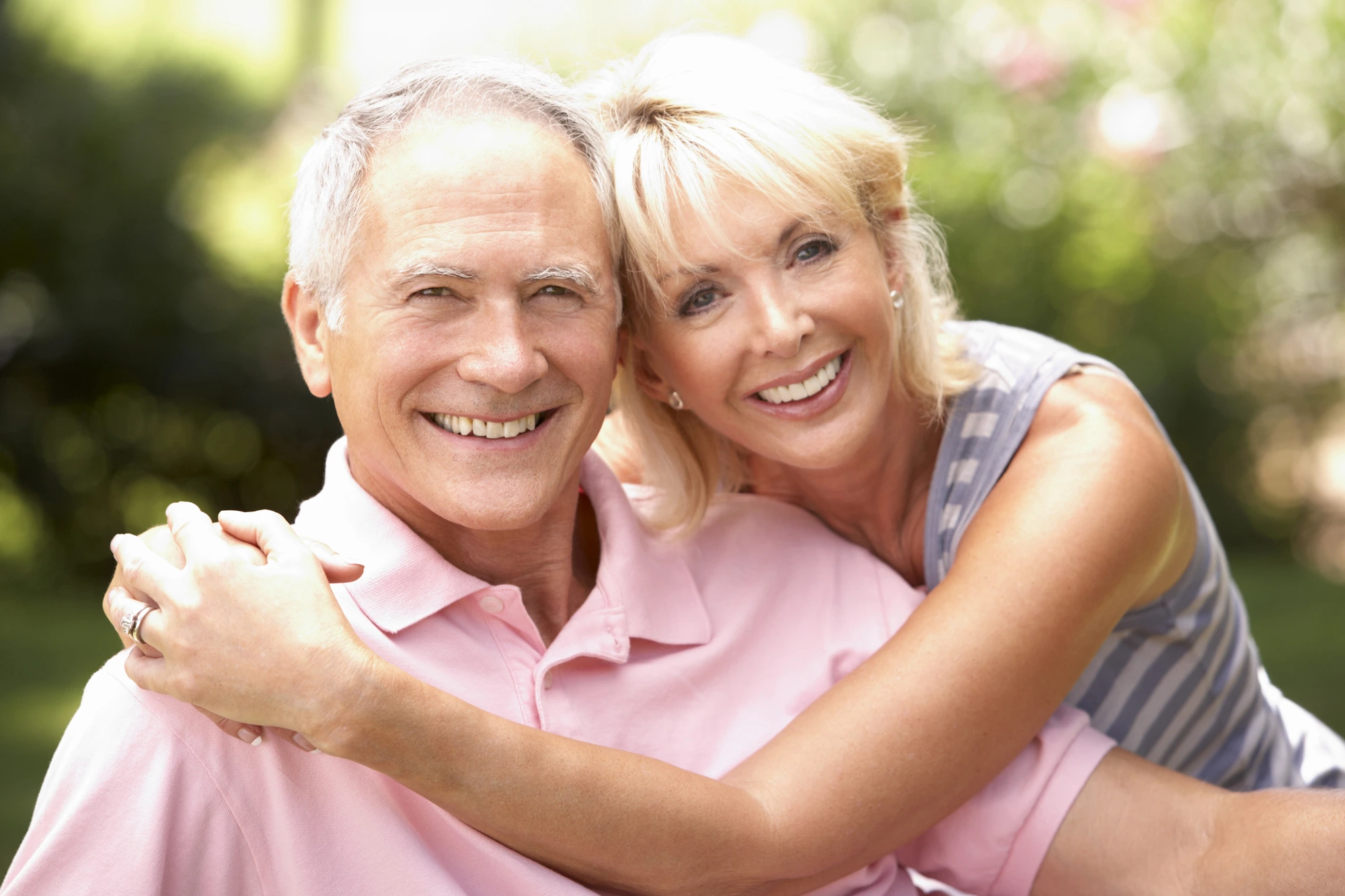 happy couple after teeth whitening in Uptown Charlotte